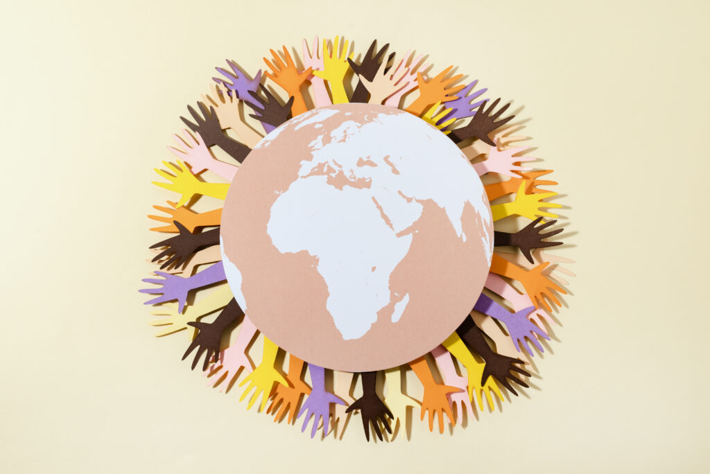 paper-style-earth-globe-with-hands